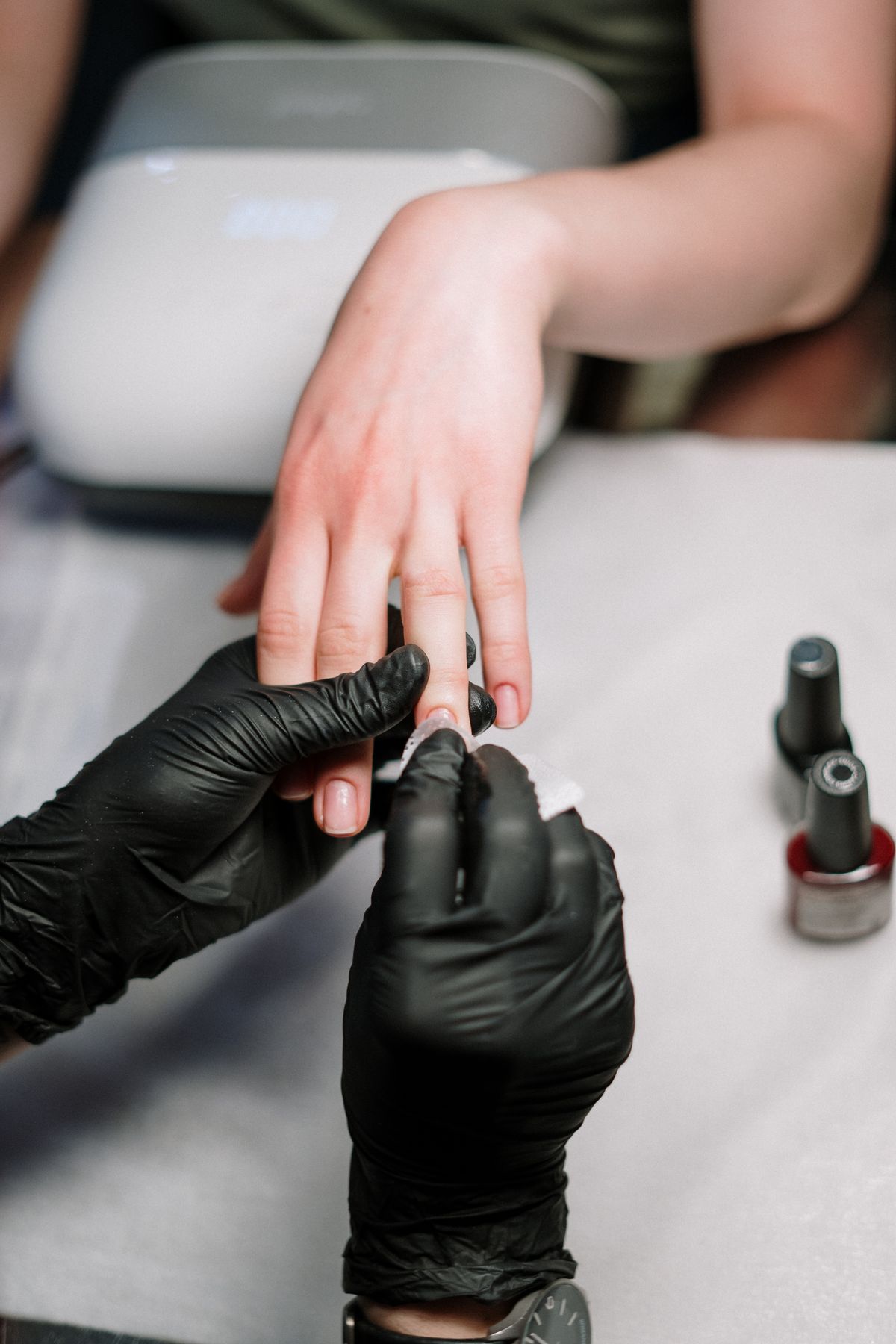 Cuticle cleanup and gel manicure application at Sphere Nails Bar